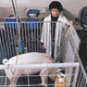 Croney with “Omelet” the pig.